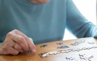 Senior lady with jigsaw